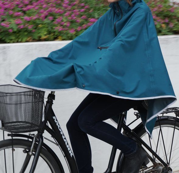 Imbris-Rain-Poncho-in-use-riding.jpg