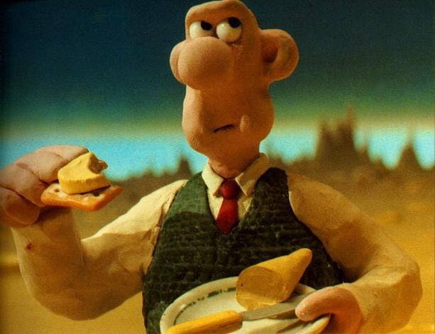 wallace_cheese_eating.jpg ht=470