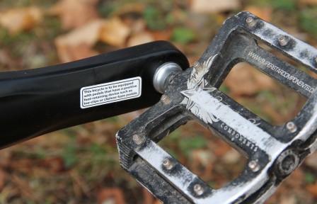 "This bicycle is to be equipped with pedals that have a positive foot-retaining device such as toe-clips or clipless-type pedals."
